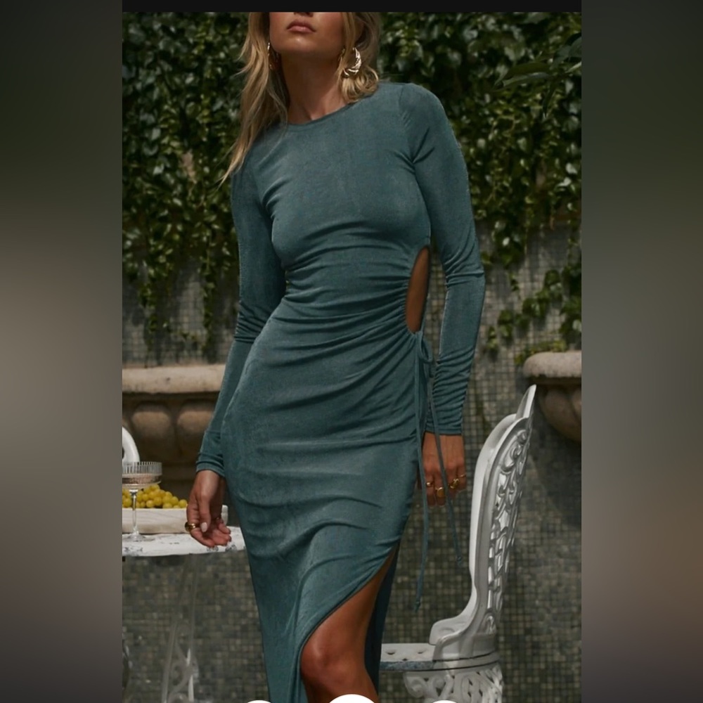 Green long sleeve velvet style dress. Never worn.